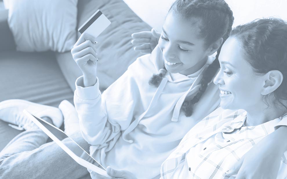 Kids, Credit Cards, and Financial Futures mom and girl with credit card