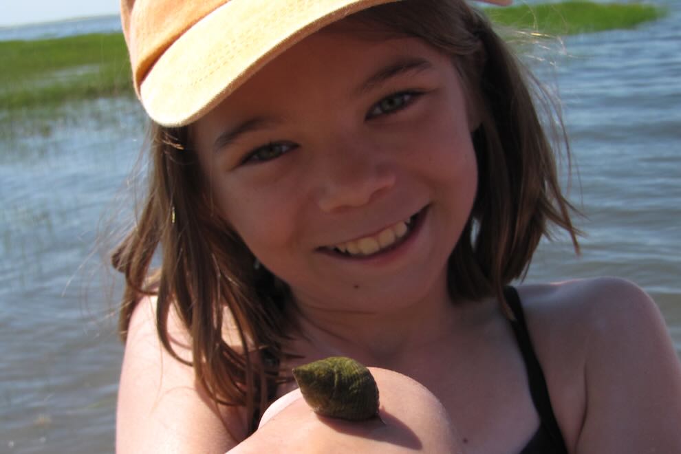 Look Who’s Homeschooling! girl on beach with snail