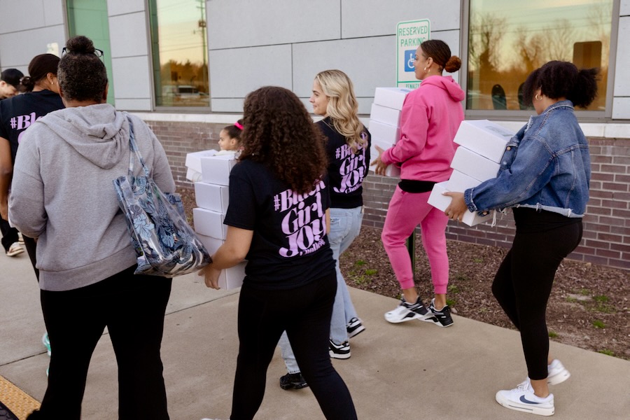 Mila and friends fill and deliver mental health boxes