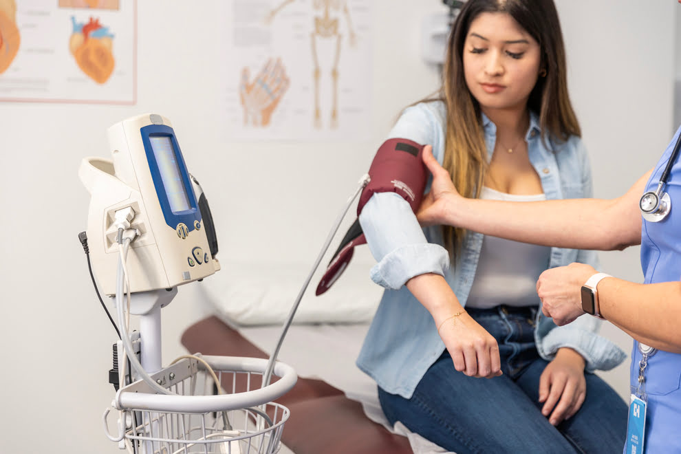 Why Women Face a Higher Risk: What Causes Strokes in Women? Female having her blood pressure measured