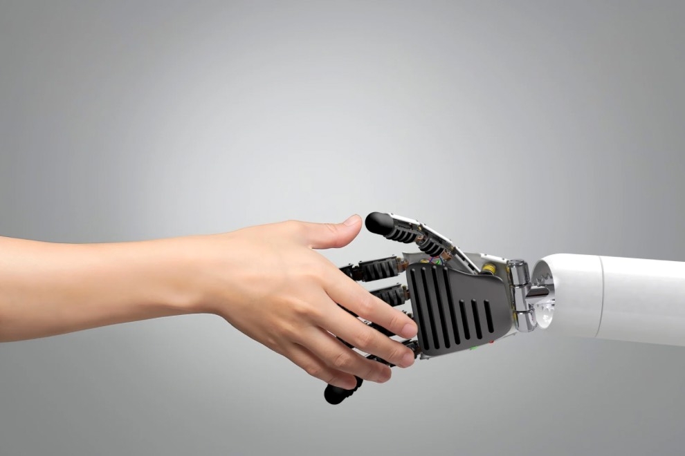 AI in Personal Finance: The Promise and the Limits robot hand shaking human hand