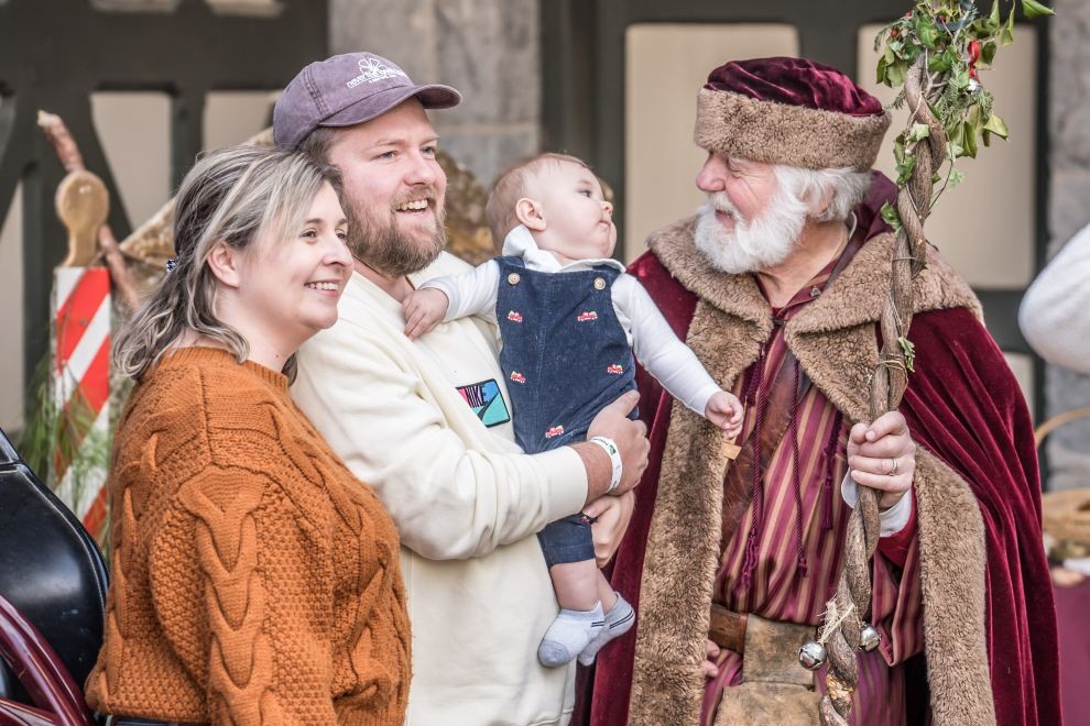 Maymont Makes the Holidays Bright with Merry Market Father Christmas with a family at Maymont Merry Market - Photo Credit Dave Parrish