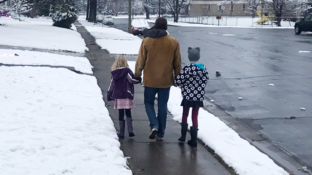Unremarkable Parenting – Loving a Trans Kid Dad and kids walking in winter