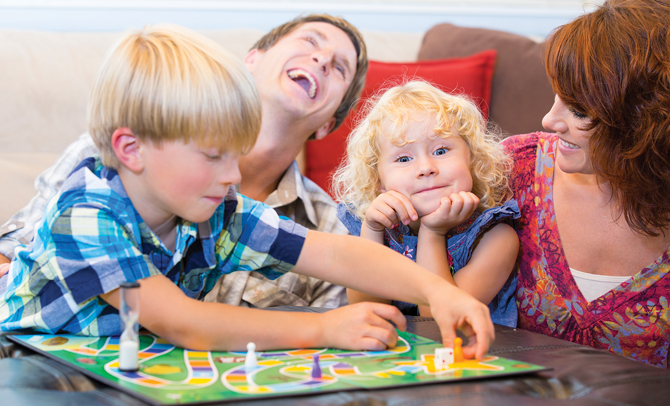 Family Board Games Equal Family Fun family playing board game