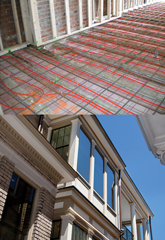 The radiant floor heating system is the most energy efficient electric heating system on the market. Low-profile replacement windows look fabulous.