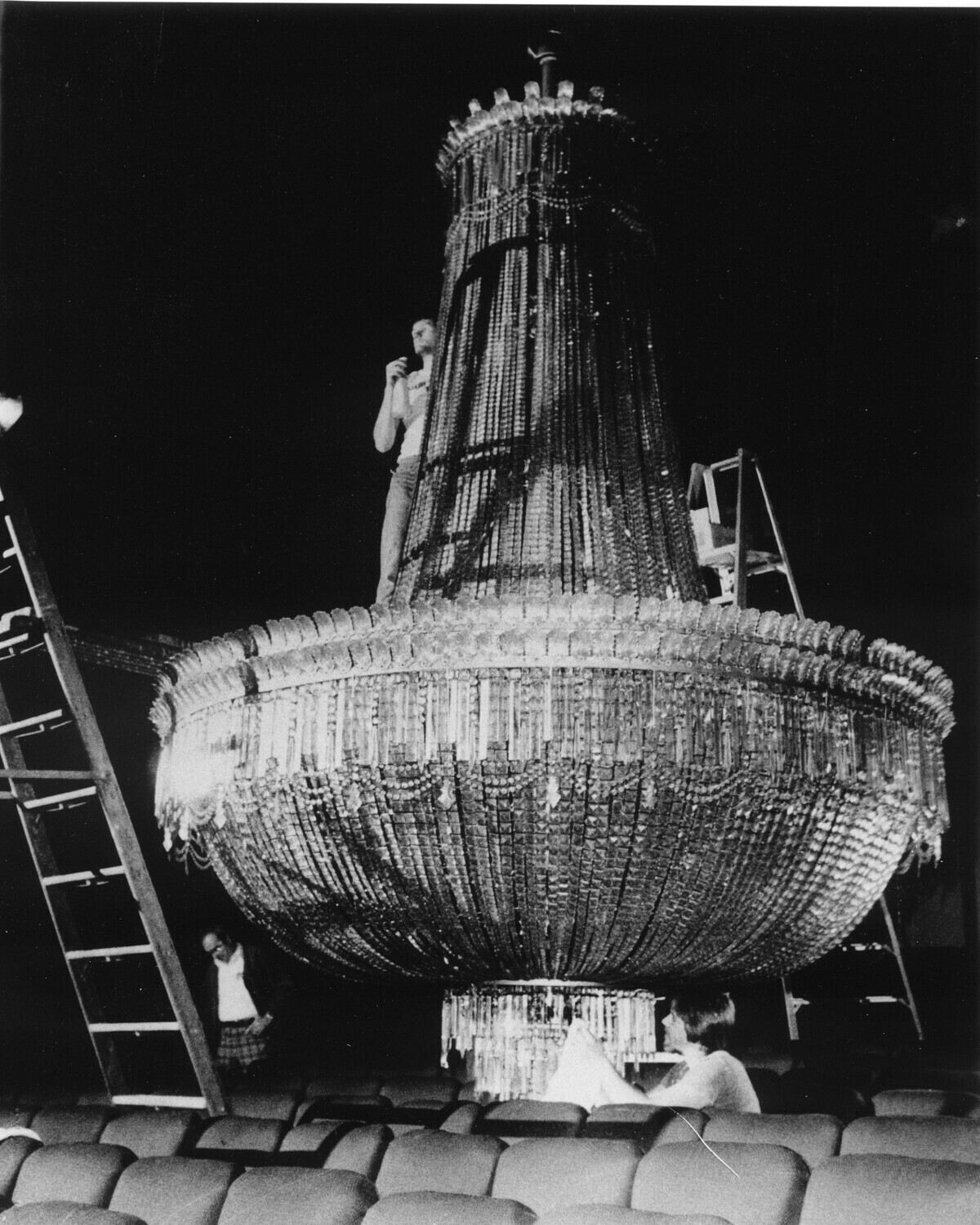 An 18-foot, two-and-a-half ton Czechoslovakian crystal chandelier is installed prior to the Byrd Theatre’s 1928 Christmas Eve opening.