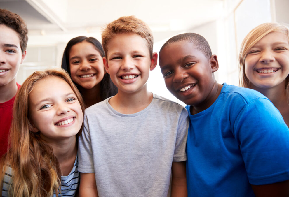 What to Know About HPV and the HPV Vaccine as New Mandate Takes Effect Male And Female Students Kids In Grade School Classroom